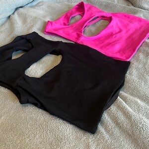 Two fitted gym crop tops with criss cross back. Size xs-small.